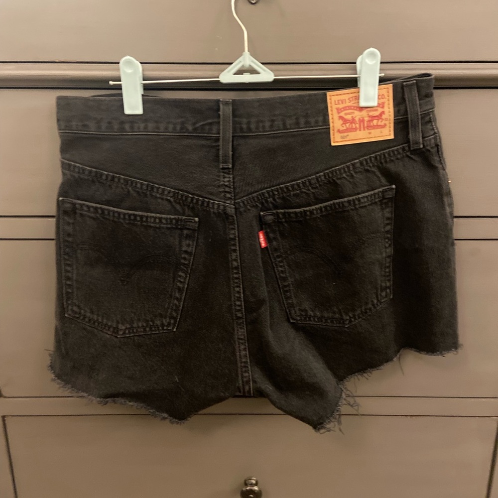 Levi’s 501 black button-fly cut-offs, size 31
